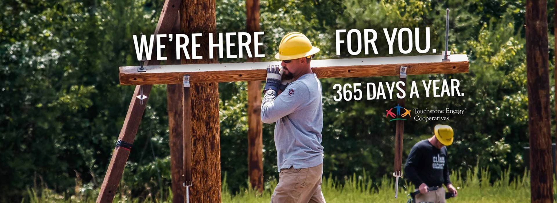 We're here for you. 365 Days a Year. (Man working on power pole)